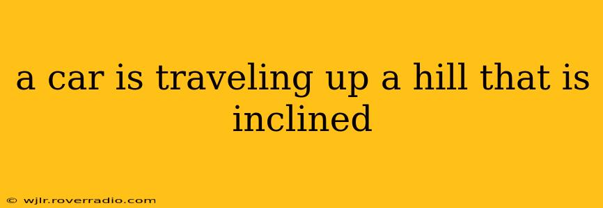a car is traveling up a hill that is inclined