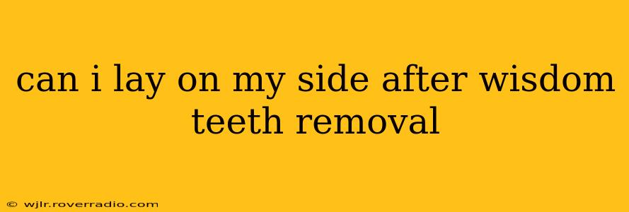 can i lay on my side after wisdom teeth removal